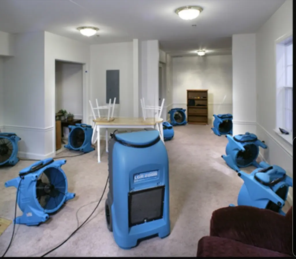 Air movers and dehumidifier setup for Water Damage Restoration in Helotes